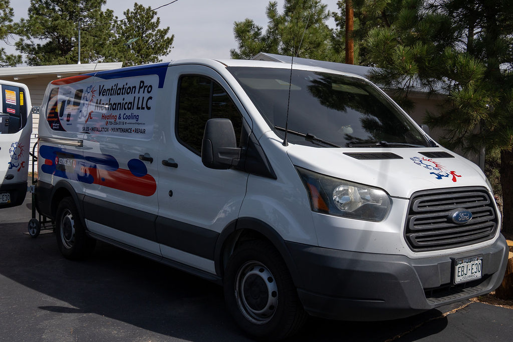 Ventilation Pro Mechanical service van outside a residential property